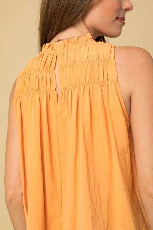 apricot cinched sleeveless top