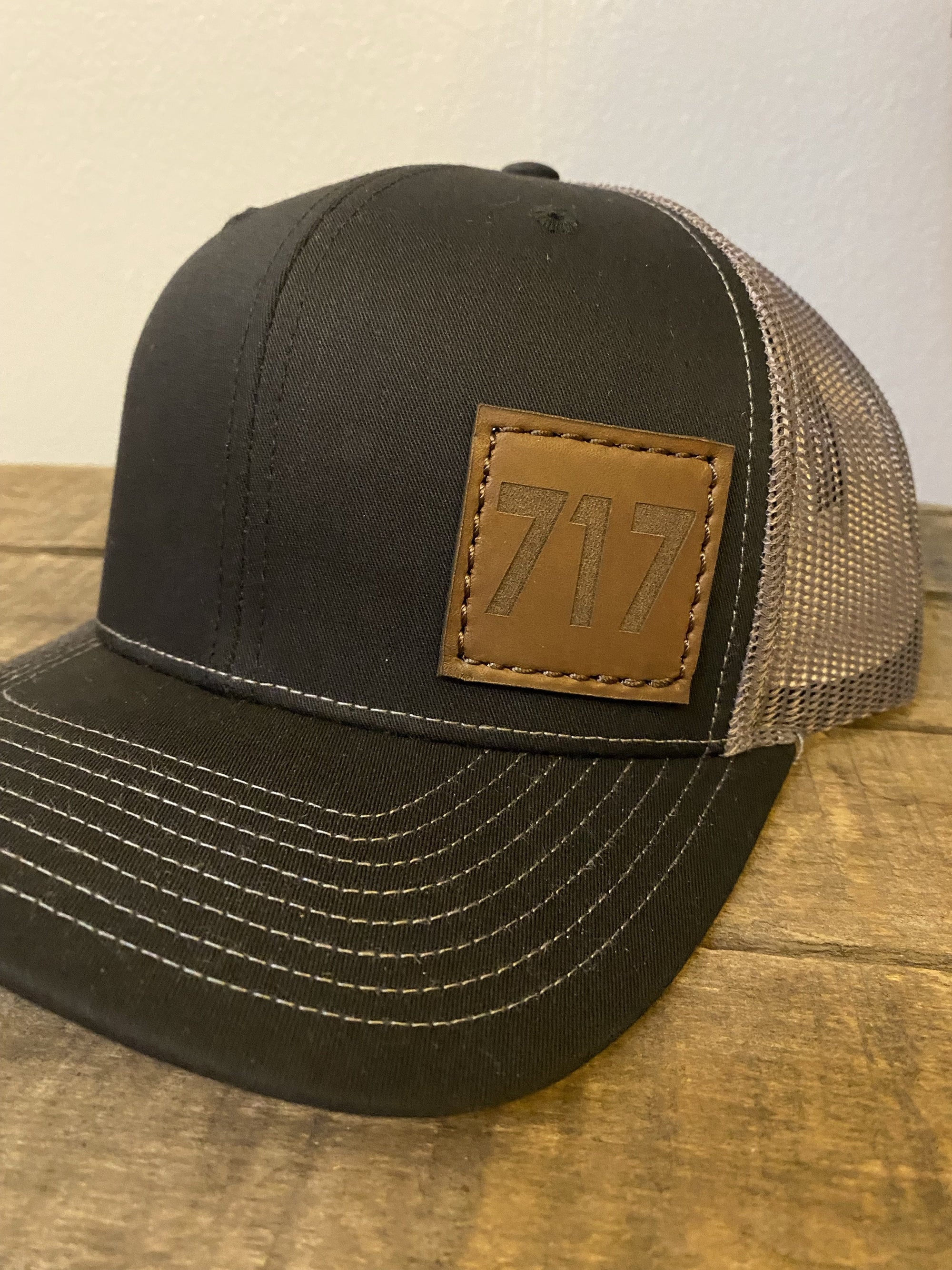 717 logo black trucker hat