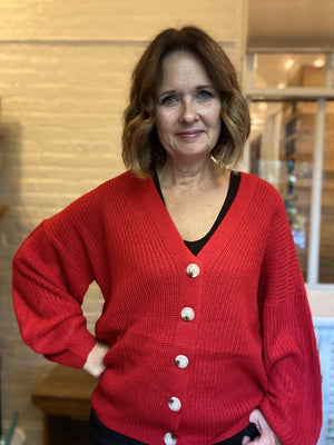 red buttondown cardigan sweater